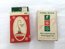 Load image into Gallery viewer, Vintage ornament hangers in original box
