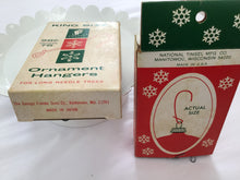 Load image into Gallery viewer, Vintage ornament hangers in original box

