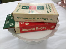 Load image into Gallery viewer, Vintage ornament hangers in original box
