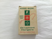 Load image into Gallery viewer, Vintage ornament hangers in original box
