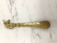 Load image into Gallery viewer, Vintage brass unicorn shoehorn
